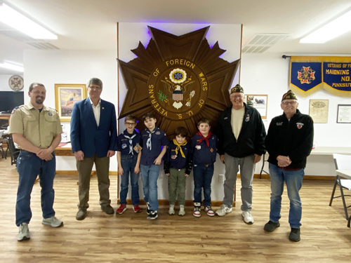 (From left to right) Cory Shaffer joins Rep. Brian Smith, Blake Shaffer, Logan McHenry, Jerremy Cassatt and Nathan Cassatt for a photo with members of the Punxsutawney VFW to announce a Flag Retirement Ceremony.
